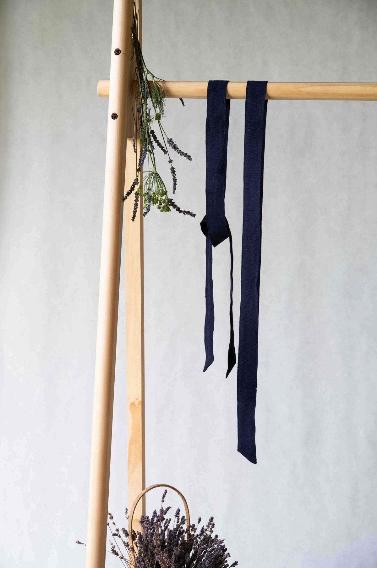 Detail of REWANA navy blue hemp tie scarf without embroidery