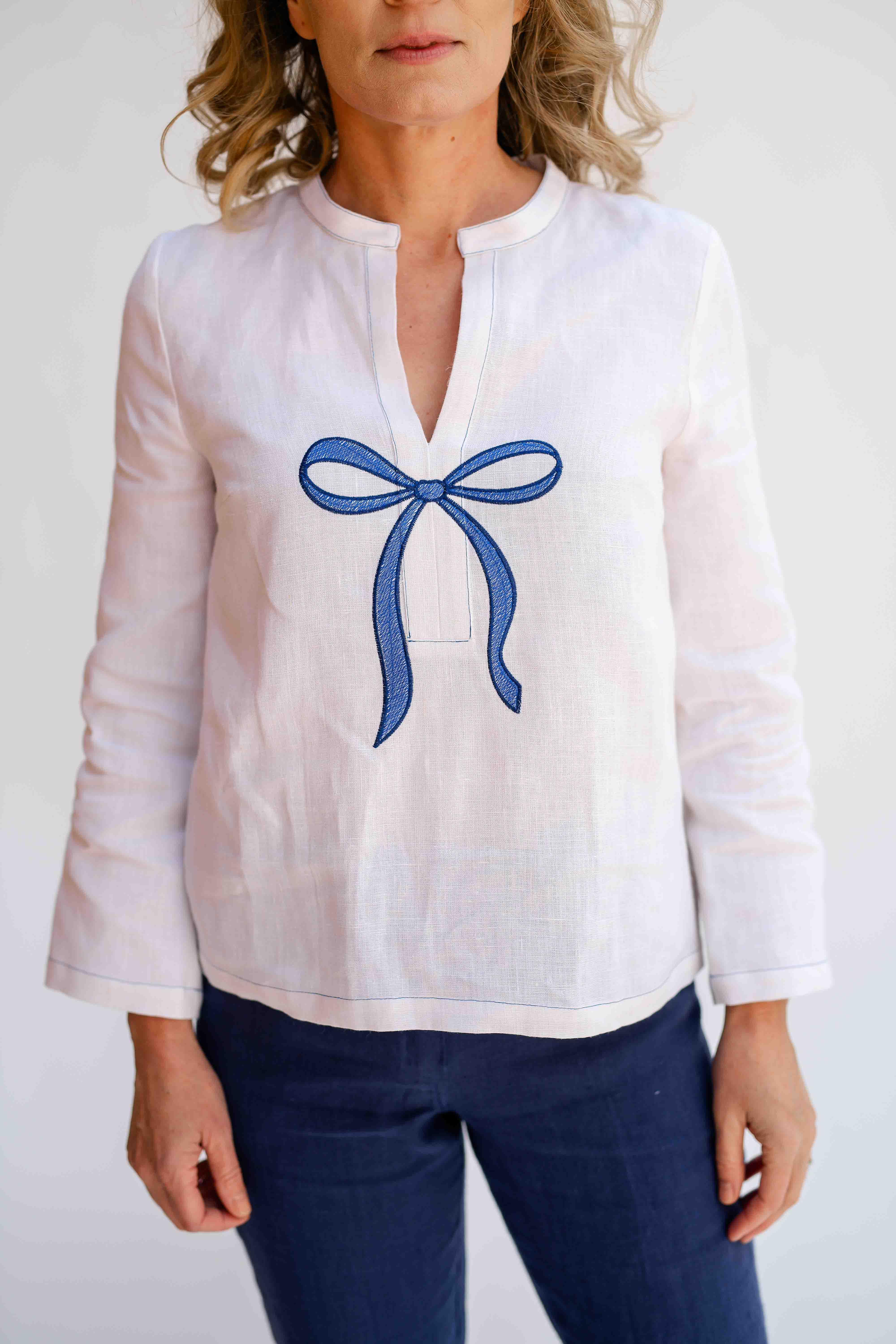 REWANA WOMEN'S TUNIC MADE OF HEMP FABRIC WITH BLUE BOW EMBROIDERY IN IVORY COLOR